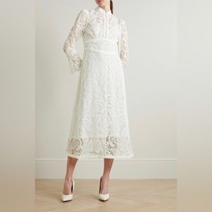 Zimmermann paisley-patterned ivory lace. Featured in the Wonderland collection.